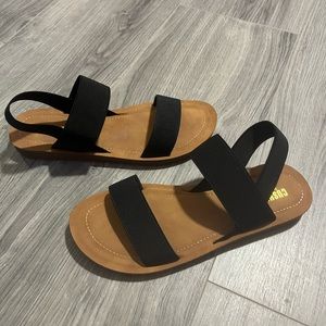 Black elastic strap sandals by Cushionaire. Size 6.5.